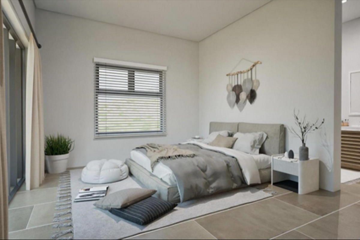 A modern bedroom featuring large format floor tiles, sliding glass doors, and an open-plan layout connecting to an en-suite bathroom area.