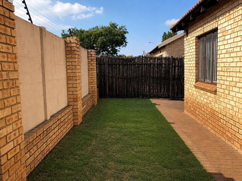 Secure Family Living | North-Facing 2 Bedroom Townhouse with Garage - Photo 3