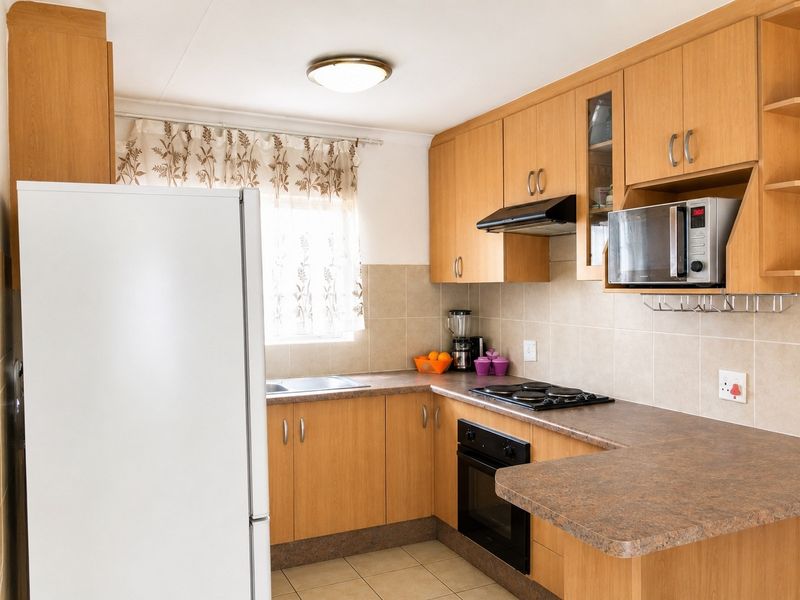 Secure Family Living | North-Facing 2 Bedroom Townhouse with Garage - Photo 5