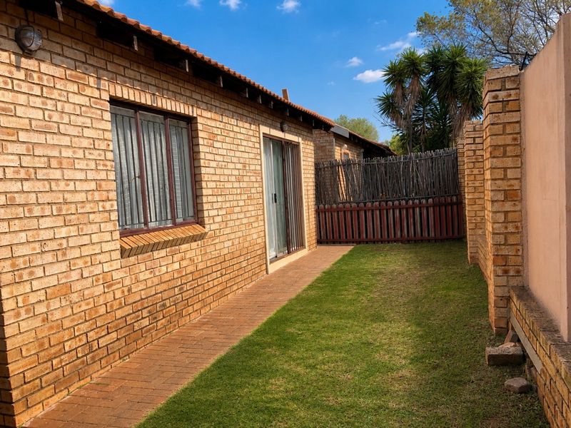 Secure Family Living | North-Facing 2 Bedroom Townhouse with Garage - Photo 2