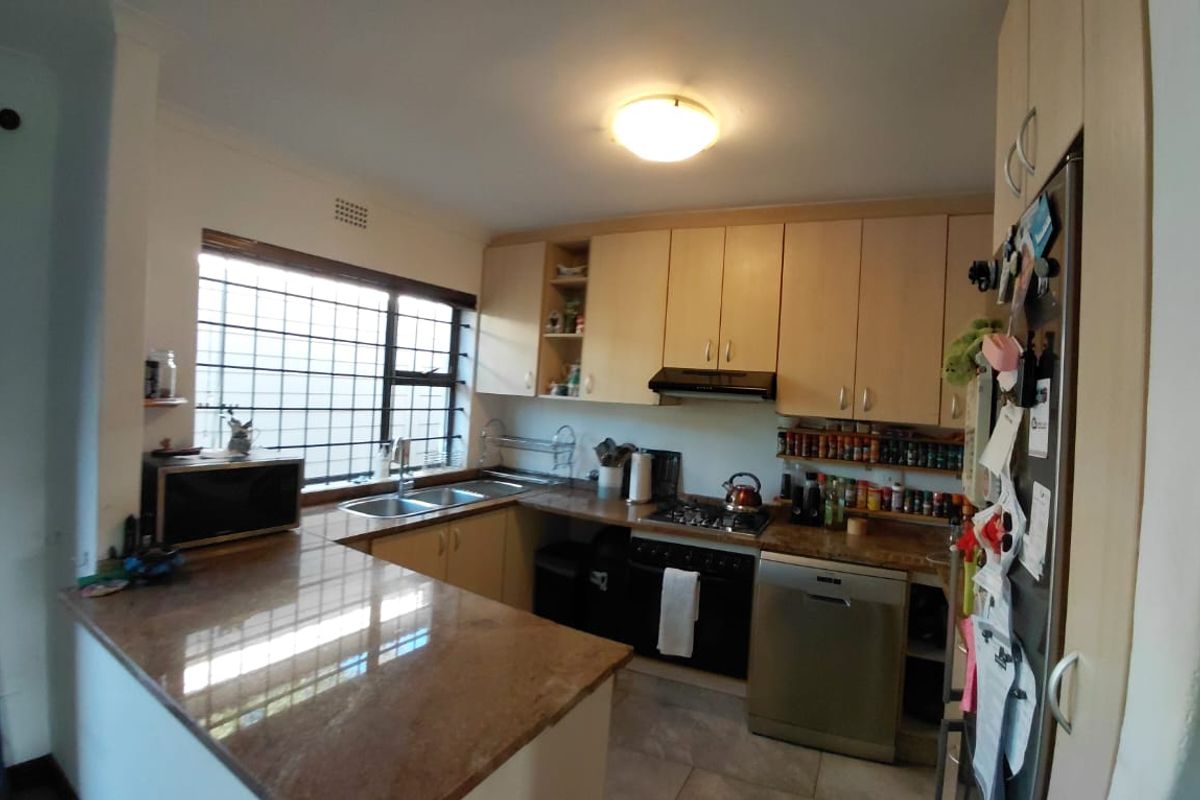 A WELL-MAINTAINED 3 BEDROOM SECTIONAL TITLE HOUSE IN A GATED ESTATE/ COMPLEX - Photo 3