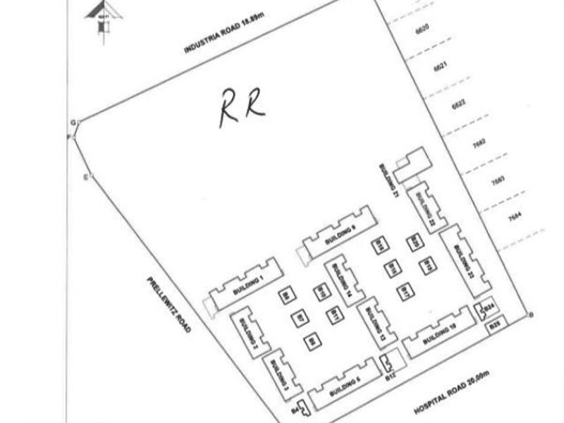 A site layout plan showing the positioning of multiple buildings on the residential land parcel.