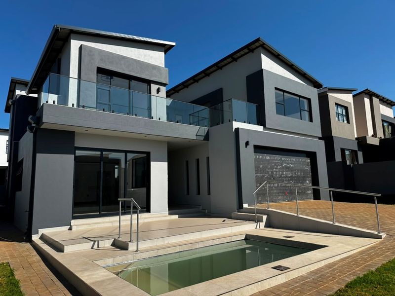 Sophisticated Family Living with Spacious Interiors and Poolside Entertainment - Photo 1