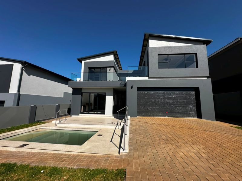 Sophisticated Family Living with Spacious Interiors and Poolside Entertainment - Photo 9