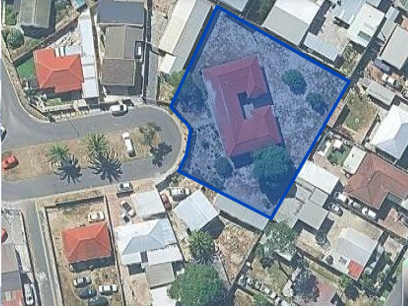 Aerial view of the property showing the house footprint and surrounding land plot within the residential neighborhood.
