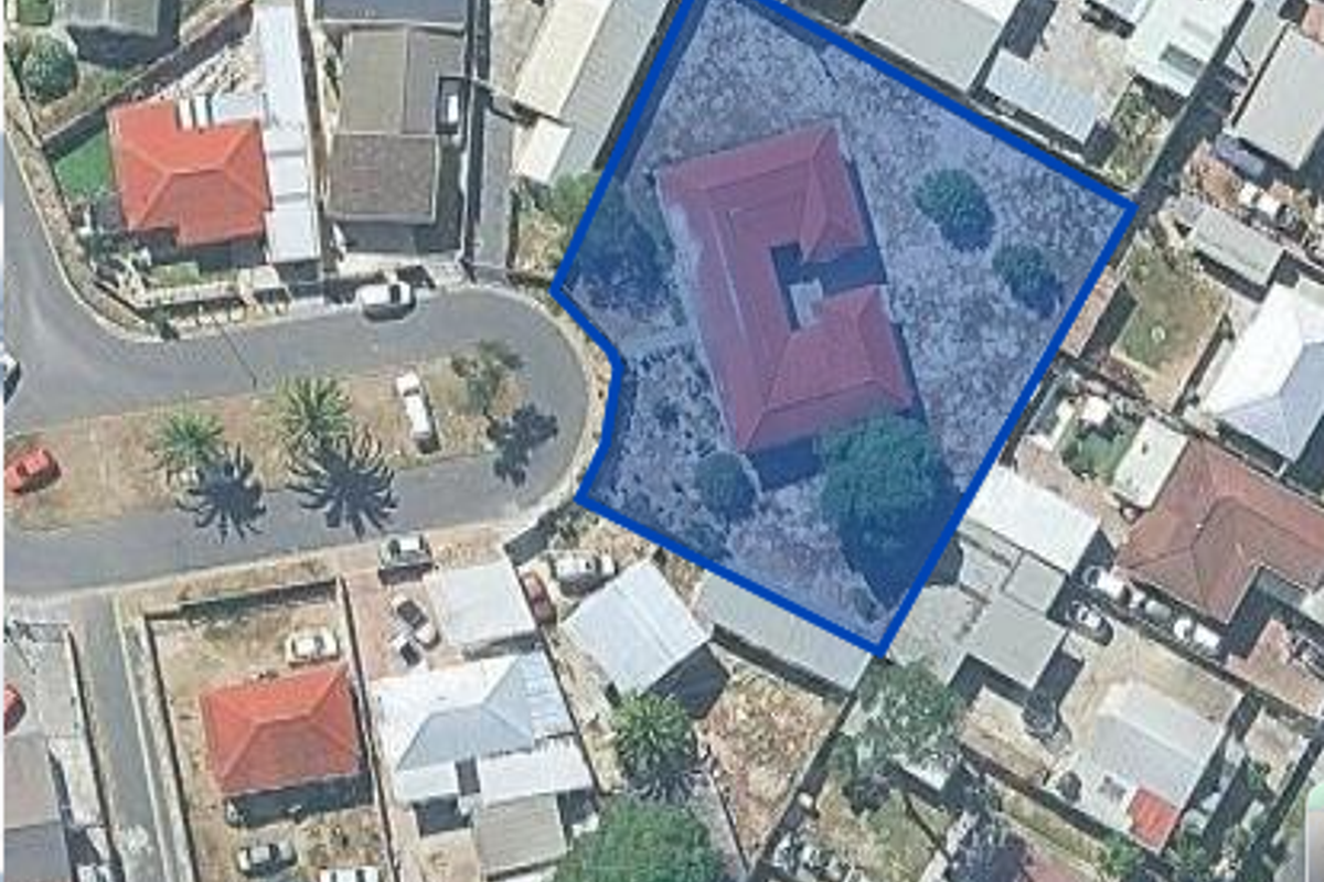 Aerial view of the property showing the house footprint and surrounding land plot within the residential neighborhood.