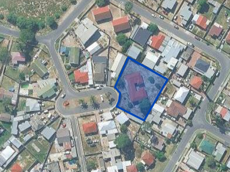 An aerial view showing the property location and its surrounding residential neighborhood layout.