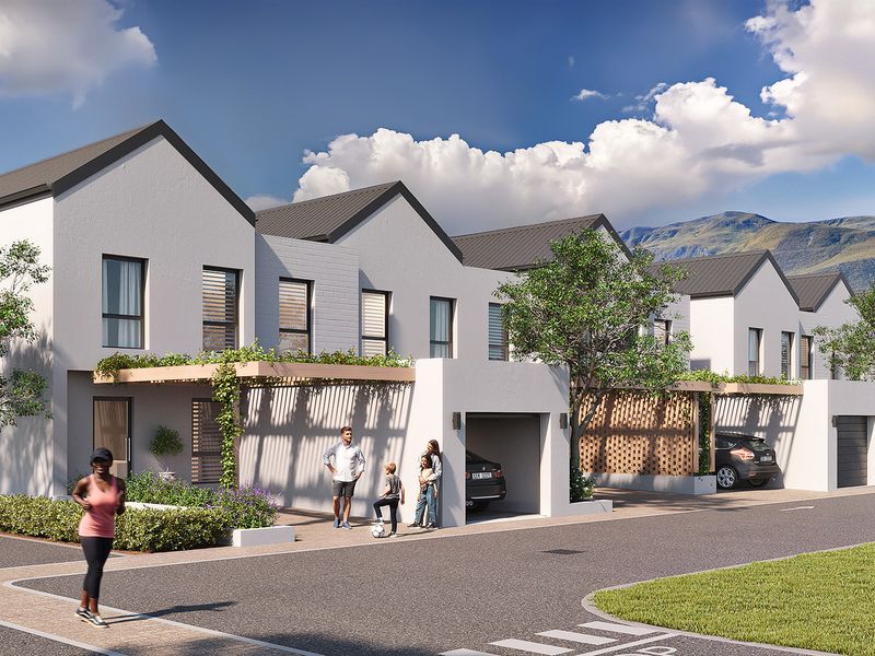 A modern townhouse development featuring pitched roofs, integrated garages, and timber pergolas, set within a landscaped residential estate with mountain views.