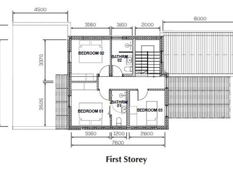 Architectural floor plan showing the layout of the first storey, including three bedrooms, two bathrooms, and staircase access.