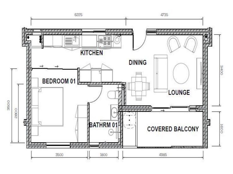 A clear architectural floor plan showing the layout of an apartment including a kitchen, lounge, dining area, bedroom, bathroom, and covered balcony.