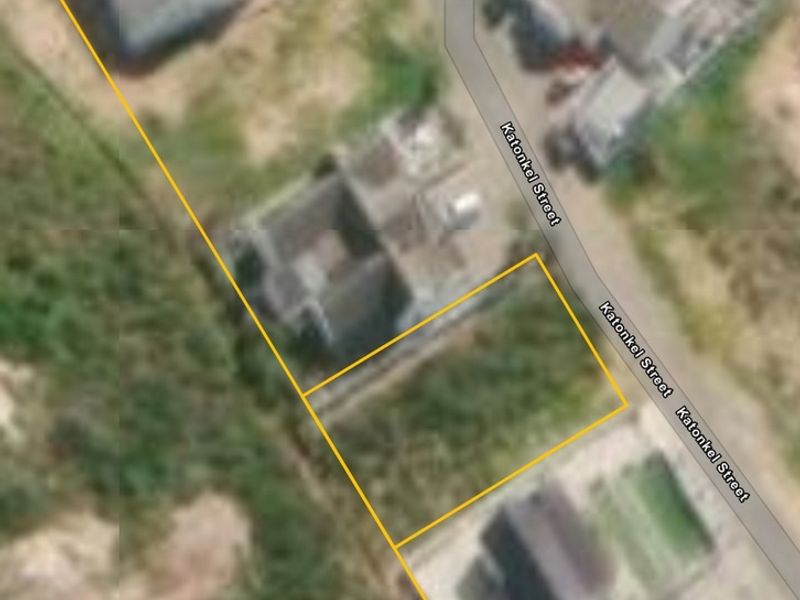 An aerial view showing the vacant residential plot with marked boundaries located along Katonkel Street.