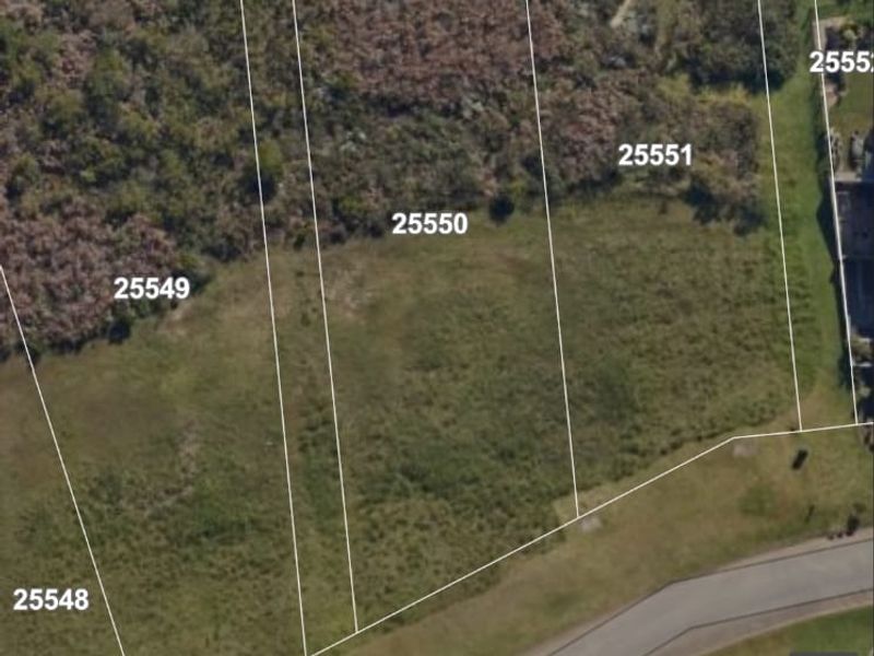 An aerial map view showing residential land parcels and surrounding road infrastructure.