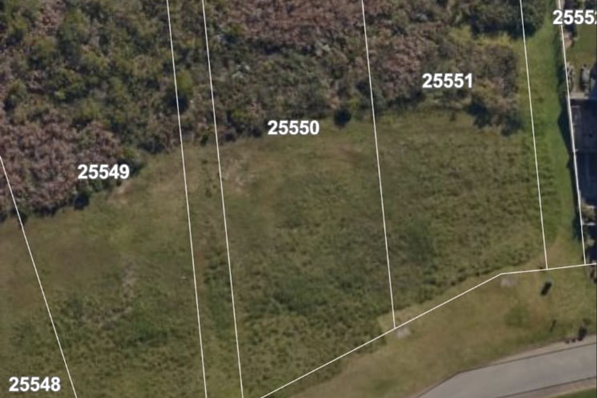 An aerial map view showing residential land parcels and surrounding road infrastructure.