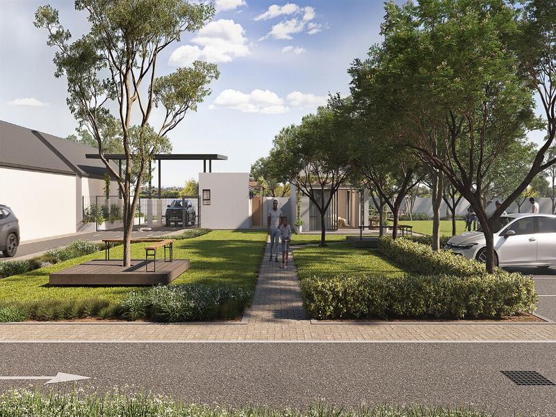 A well-maintained front exterior view of the apartment complex featuring landscaped gardens, paved walkways, and designated parking areas.