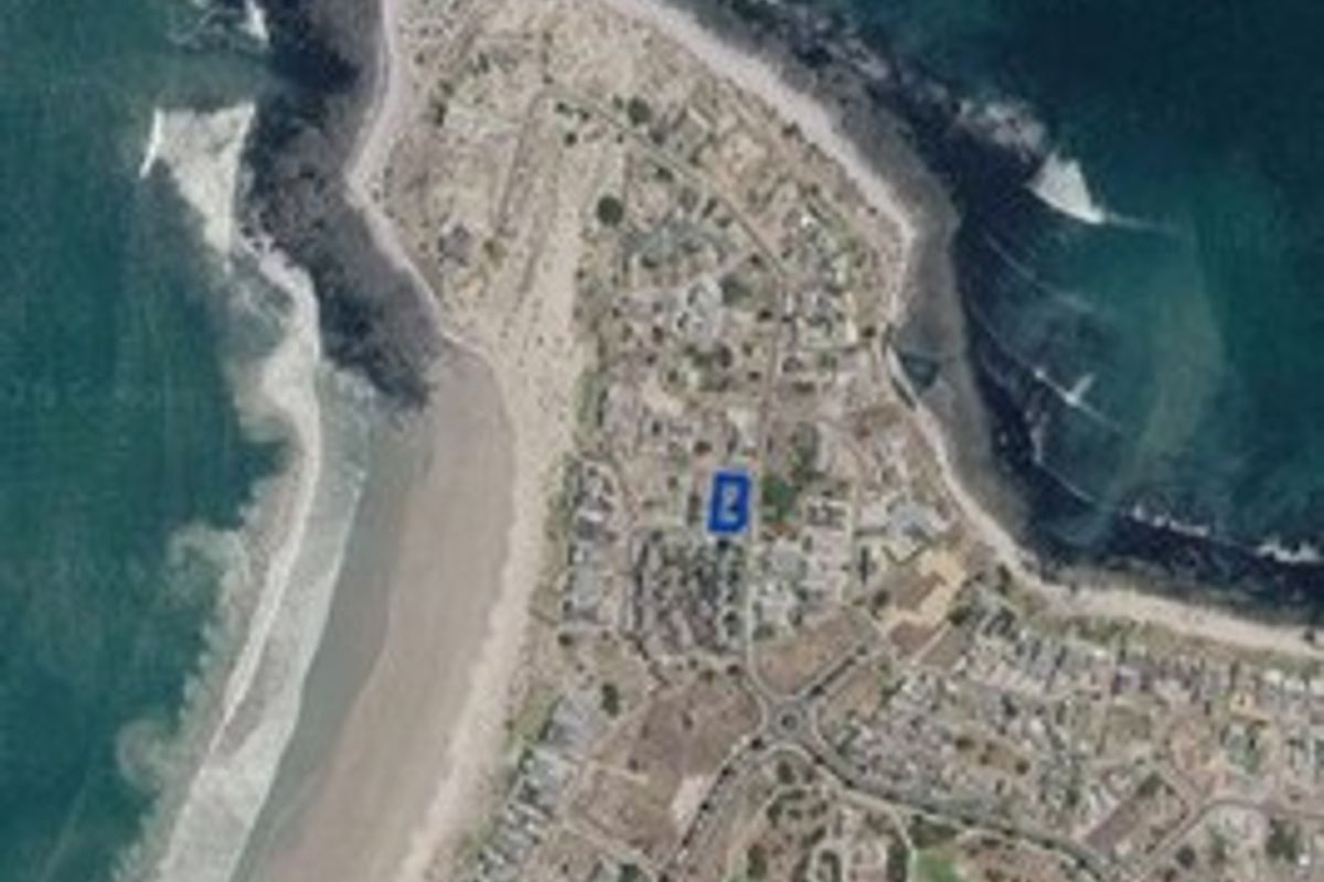 An aerial satellite view showing the coastal location and surrounding neighborhood of the property.