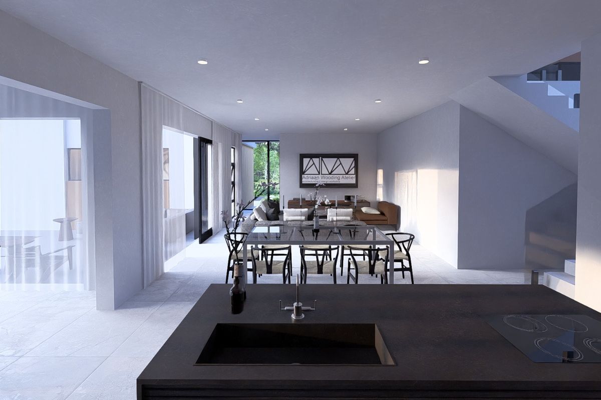 Spacious open-plan living and dining area featuring a modern kitchen island with integrated cooktop and sink, flowing seamlessly to an outdoor patio space.