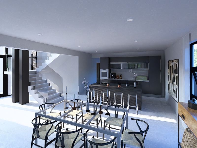 Modern open-plan living area featuring a sleek kitchen with a central island, integrated appliances, and a contemporary staircase.
