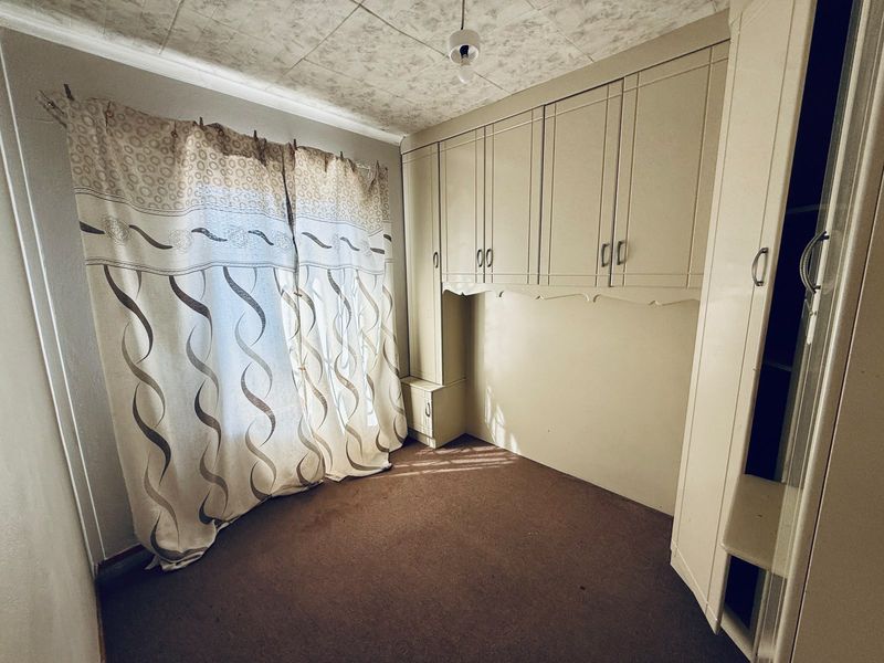Comfortable Family Home in Nkwe Estates - Photo 9