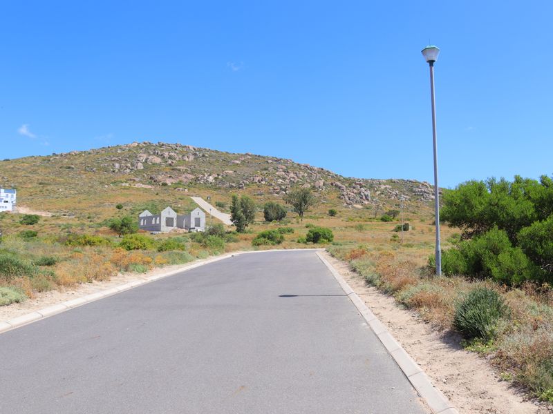 Vacant land with stunning views, perfect for building your dream home. - Photo 10