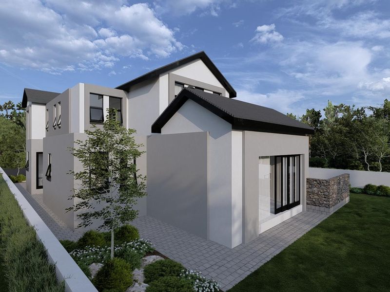 A modern two-story residential exterior featuring a paved patio, stone feature wall, and large sliding glass doors overlooking a landscaped garden.