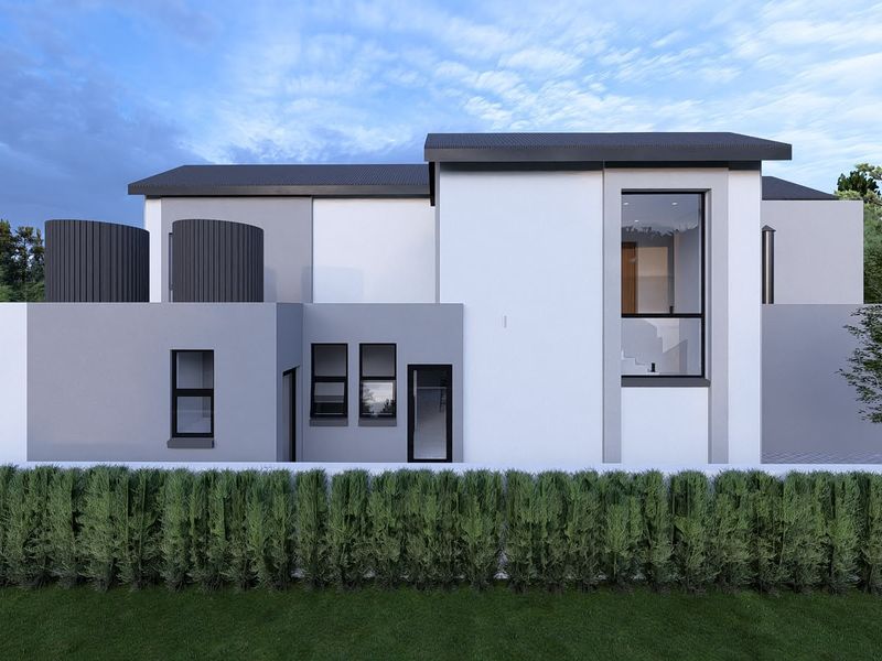 Modern rear elevation of a contemporary house featuring clean architectural lines, large windows, and integrated water tanks set against a landscaped garden.