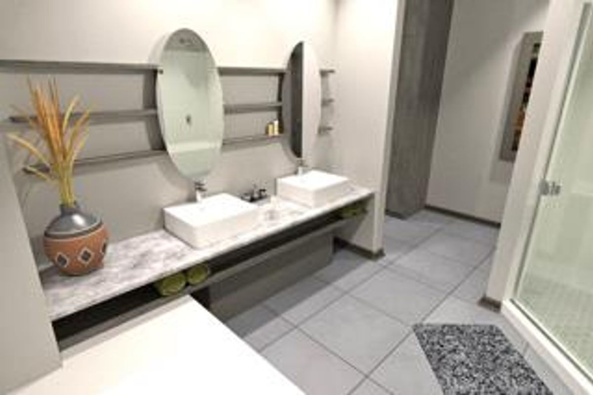 Modern bathroom featuring a double vanity with vessel sinks, wall-mounted shelving, oval mirrors, and a glass-enclosed shower with neutral floor tiling.