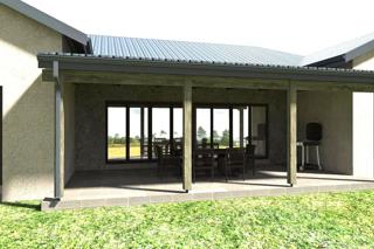 A covered outdoor patio area featuring timber support posts, a corrugated metal roof, and large sliding glass doors leading into the home.