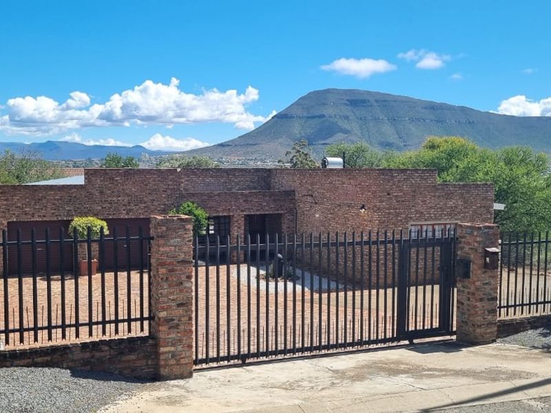 Modern 3-Bedroom Family Home with Pool, Solar Power & Entertainer’s Braai Area in Bergendal - Photo 1