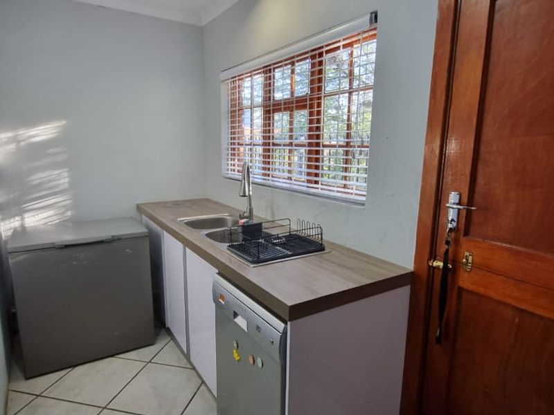 Modern 3-Bedroom Family Home with Pool, Solar Power & Entertainer’s Braai Area in Bergendal - Photo 10