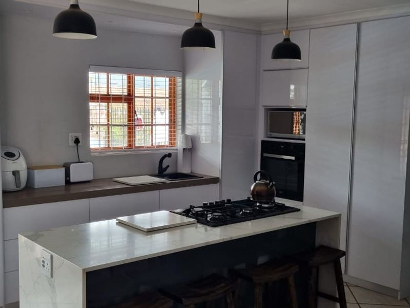 Modern 3-Bedroom Family Home with Pool, Solar Power & Entertainer’s Braai Area in Bergendal - Photo 8