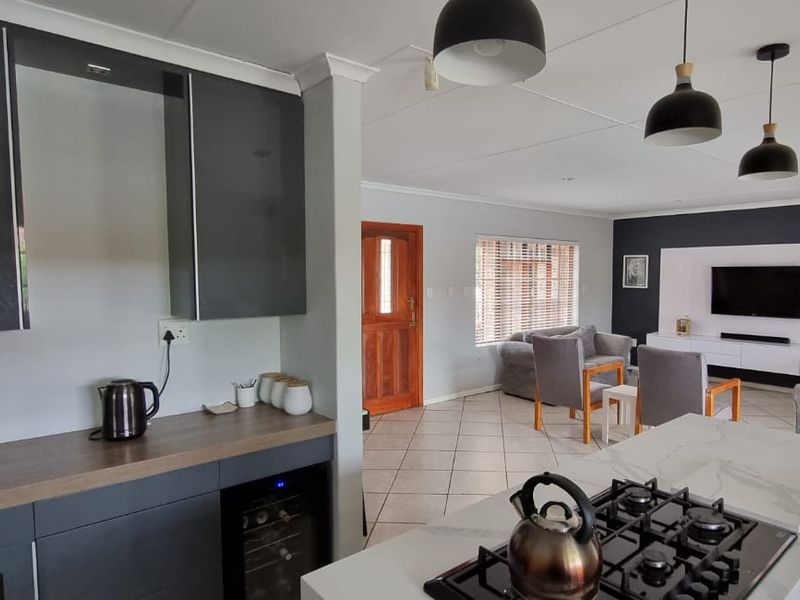 Modern 3-Bedroom Family Home with Pool, Solar Power & Entertainer’s Braai Area in Bergendal - Photo 7