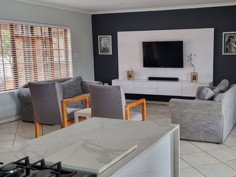 Modern 3-Bedroom Family Home with Pool, Solar Power & Entertainer’s Braai Area in Bergendal - Photo 5