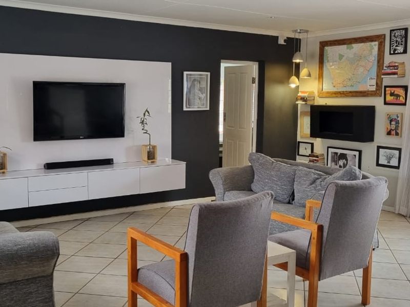 Modern 3-Bedroom Family Home with Pool, Solar Power & Entertainer’s Braai Area in Bergendal - Photo 3
