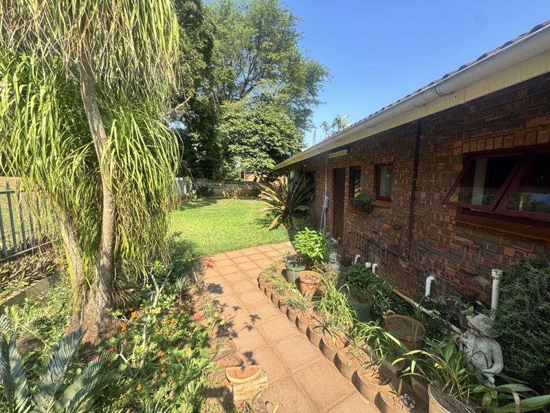 Face-brick Family Home with Flatlet - Photo 1