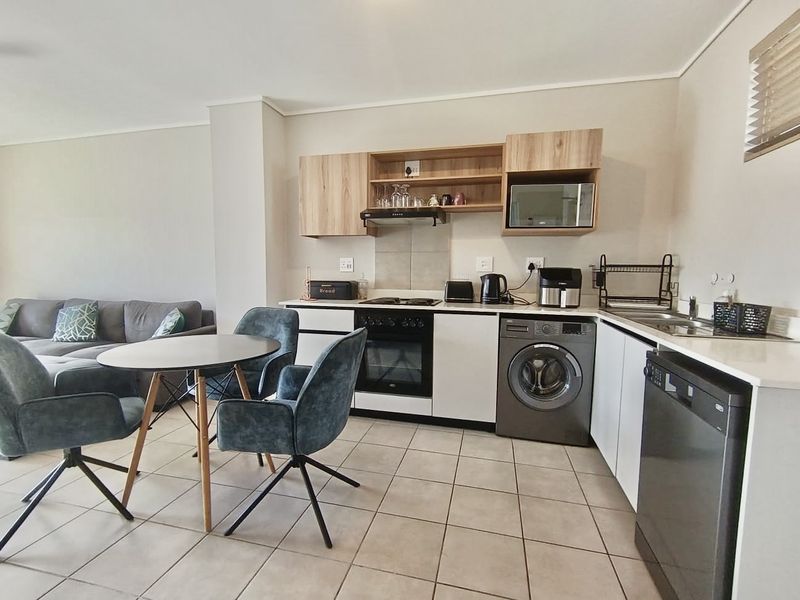 Stylish Fully Furnished Apartment with Premium Lifestyle Amenities - Photo 1