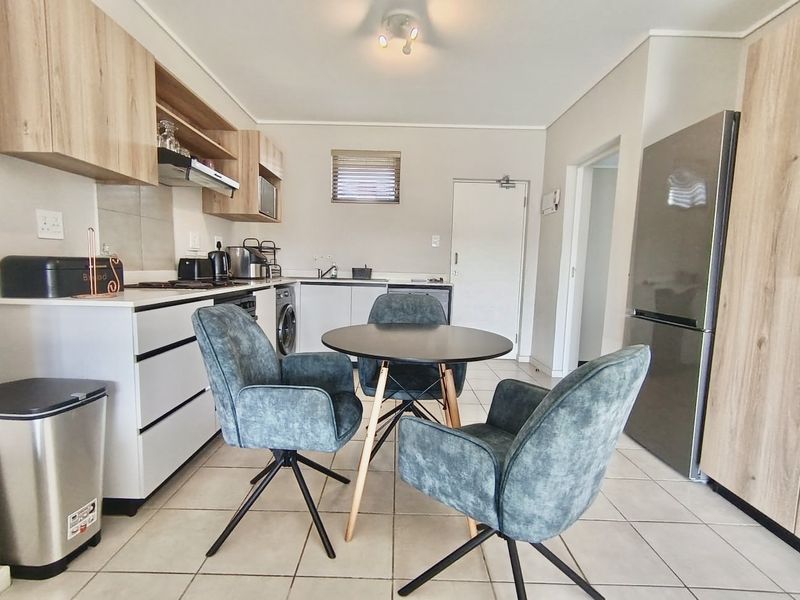 Stylish Fully Furnished Apartment with Premium Lifestyle Amenities - Photo 2