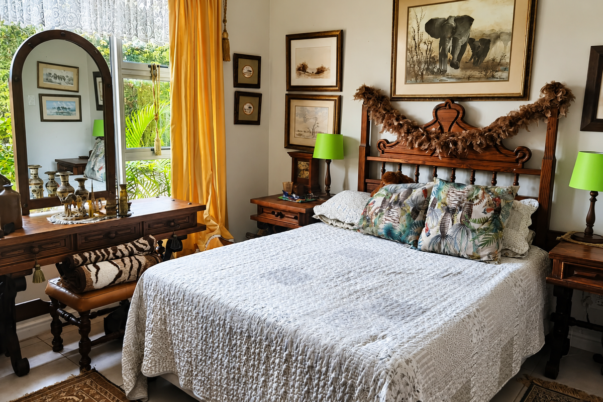 A well-maintained bedroom featuring tiled flooring and a large window with natural light, offering a comfortable and functional living space.