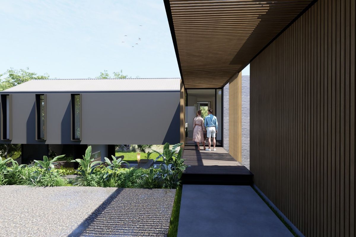 A modern architectural exterior view featuring a covered timber walkway, sleek dark cladding, and landscaped garden elements.