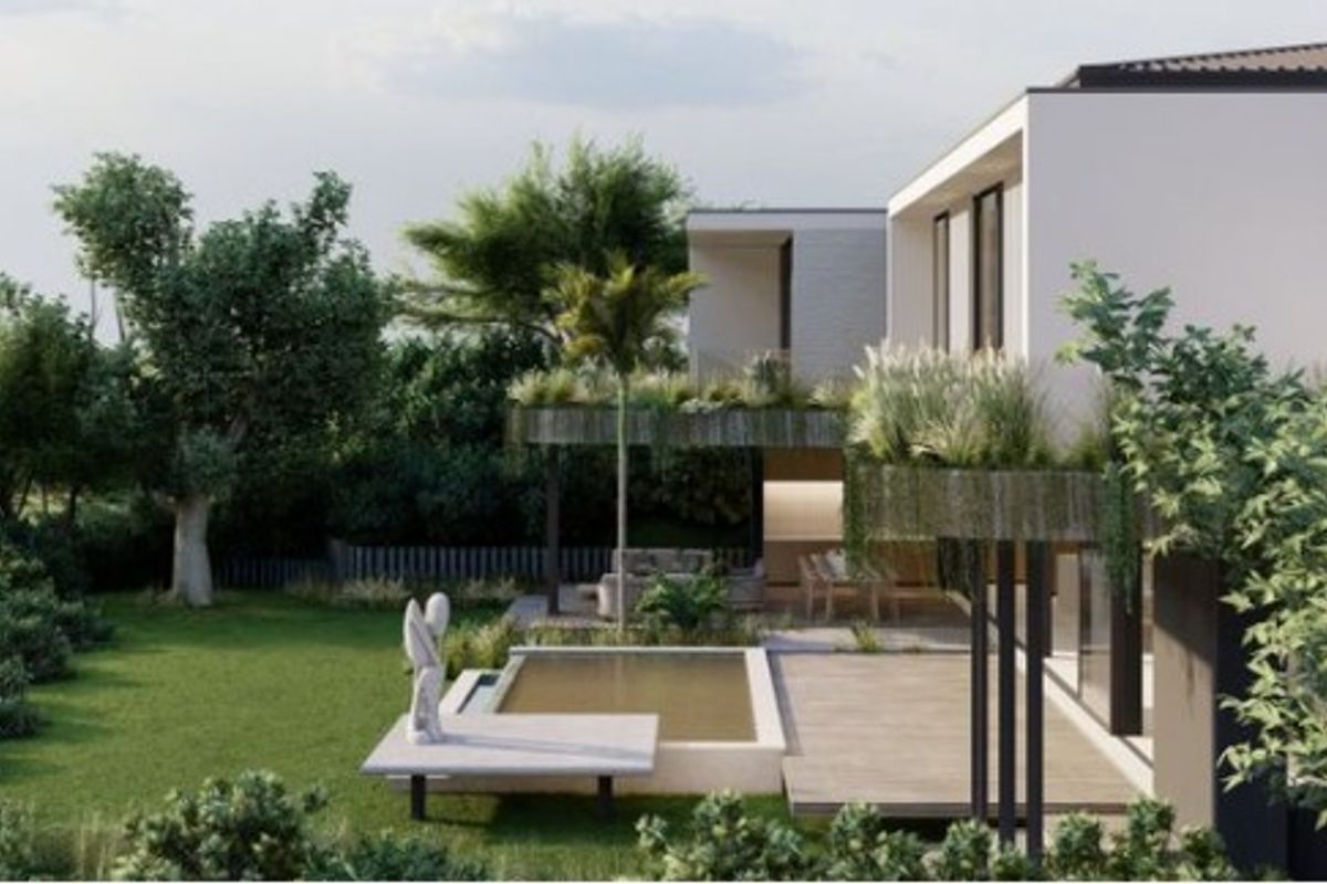 A modern residential rear exterior featuring a swimming pool, wooden decking, covered patio, and lush landscaped garden.
