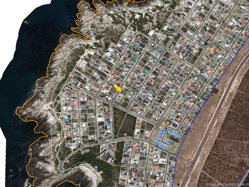 An aerial satellite view of a residential coastal neighborhood showing the property location and surrounding street layout.