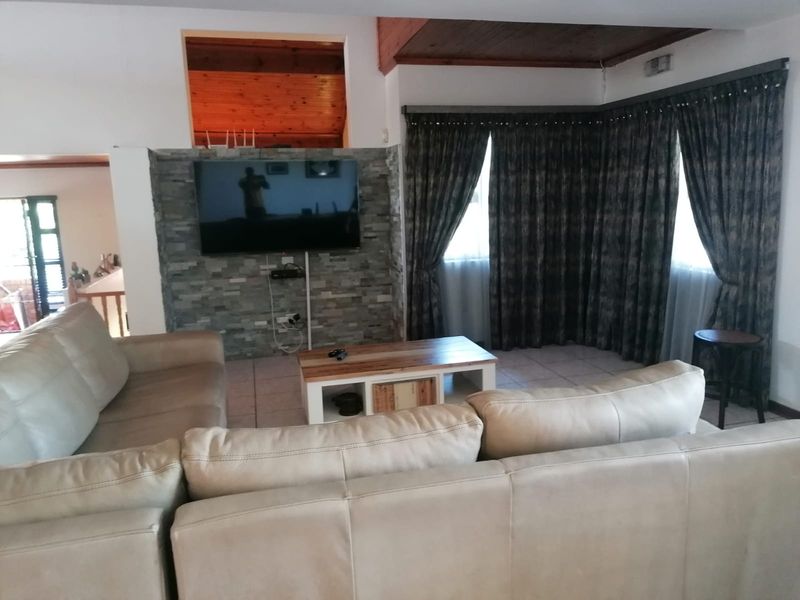 Elegant 4-Bedroom Family Home with Elevated Living in a Sought-After Location - Photo 10