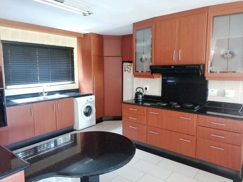 Elegant 4-Bedroom Family Home with Elevated Living in a Sought-After Location - Photo 7