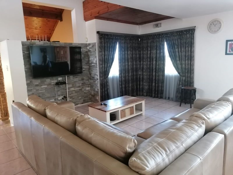 Elegant 4-Bedroom Family Home with Elevated Living in a Sought-After Location - Photo 6