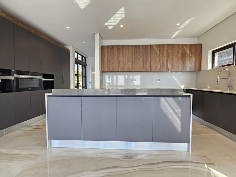 Step Into Sophistication — A Three-Level Masterpiece in Idwala Circle, Izinga Park - Photo 5