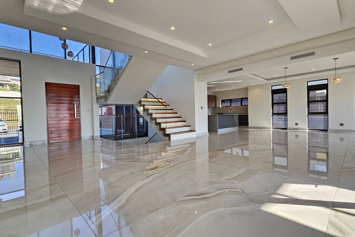 Step Into Sophistication — A Three-Level Masterpiece in Idwala Circle, Izinga Park - Photo 2