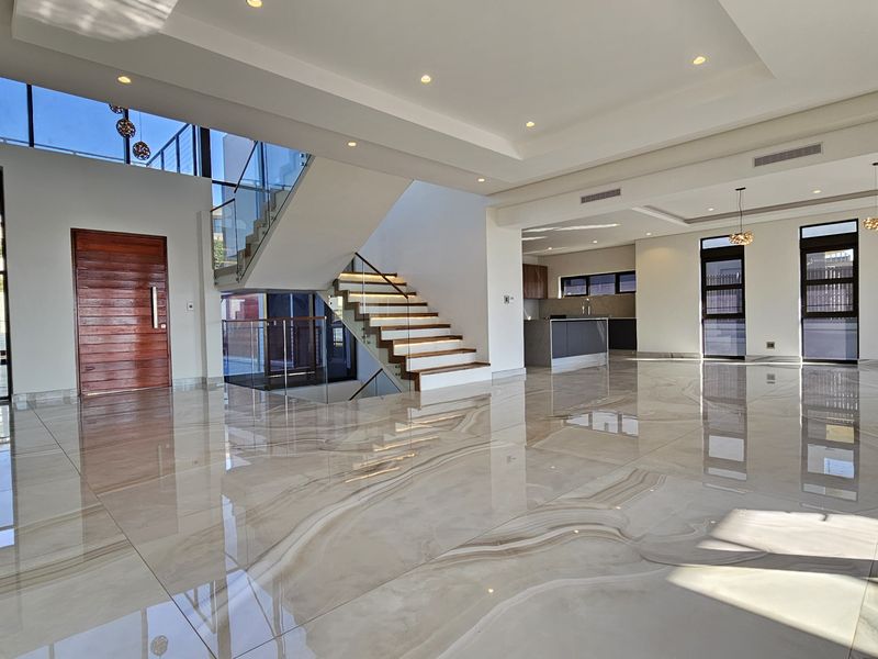 Step Into Sophistication — A Three-Level Masterpiece in Idwala Circle, Izinga Park - Photo 2