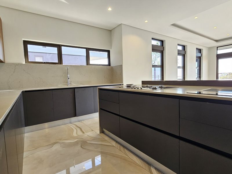 Step Into Sophistication — A Three-Level Masterpiece in Idwala Circle, Izinga Park - Photo 9