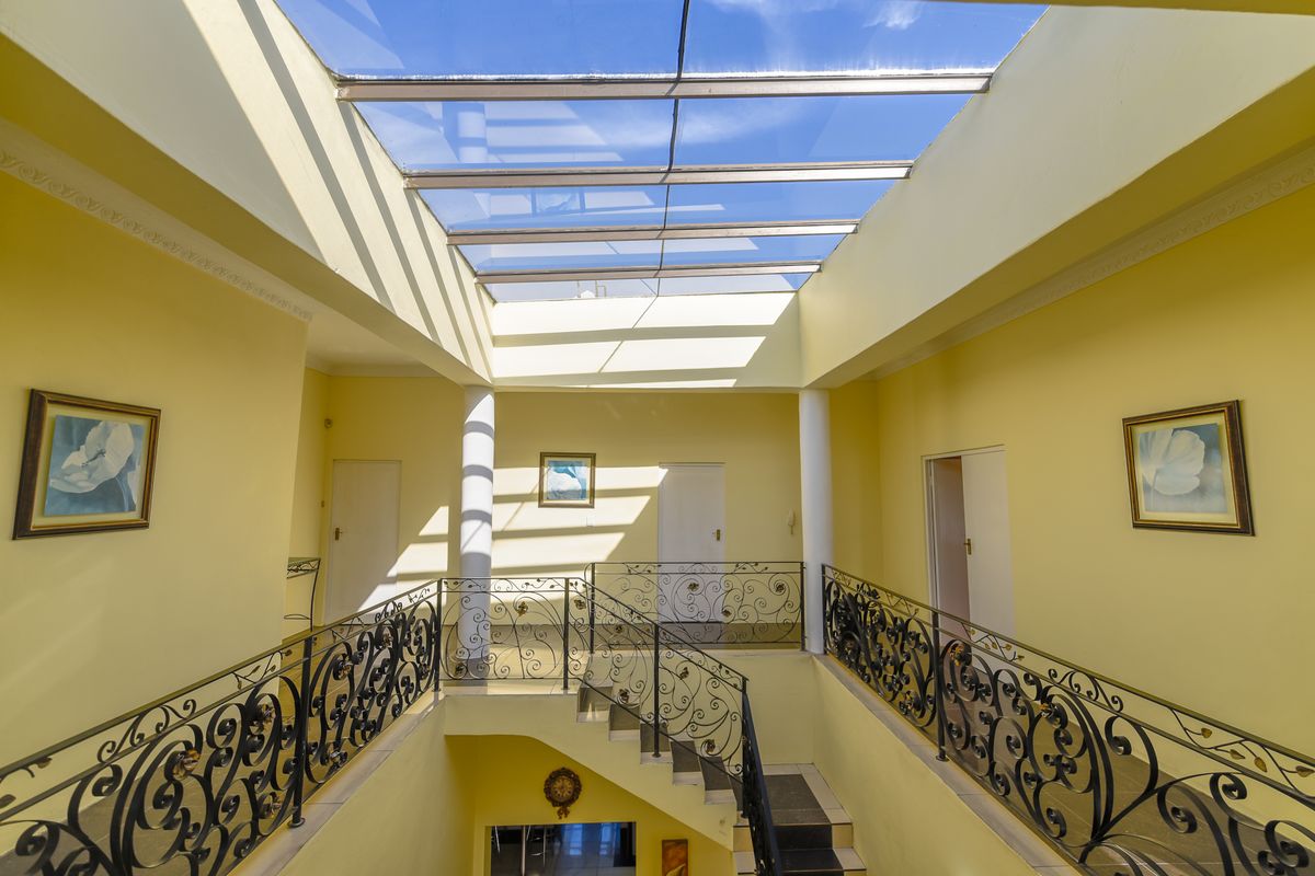 Exquisite 5-Bedroom Family Home with Premium Features - Photo 2