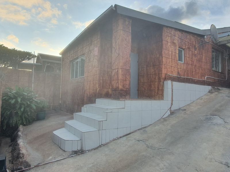 Live Smart in Trenance Manor — Exceptional 7‐Bedroom Home with Two Brand‐New Outbuildings - Photo 2