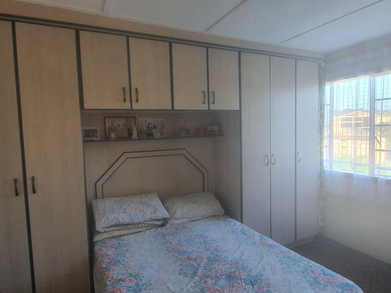 Three Bedroom Corner Property with Huge Yard and Two Road Access - Photo 10